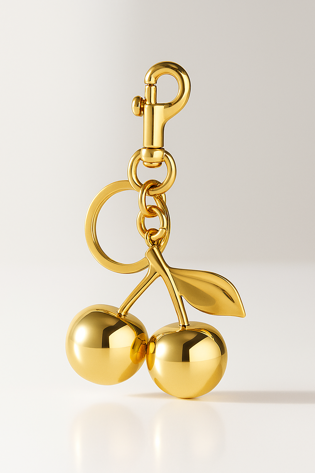 Gold Cherry Charm Keychain – Glossy Finish