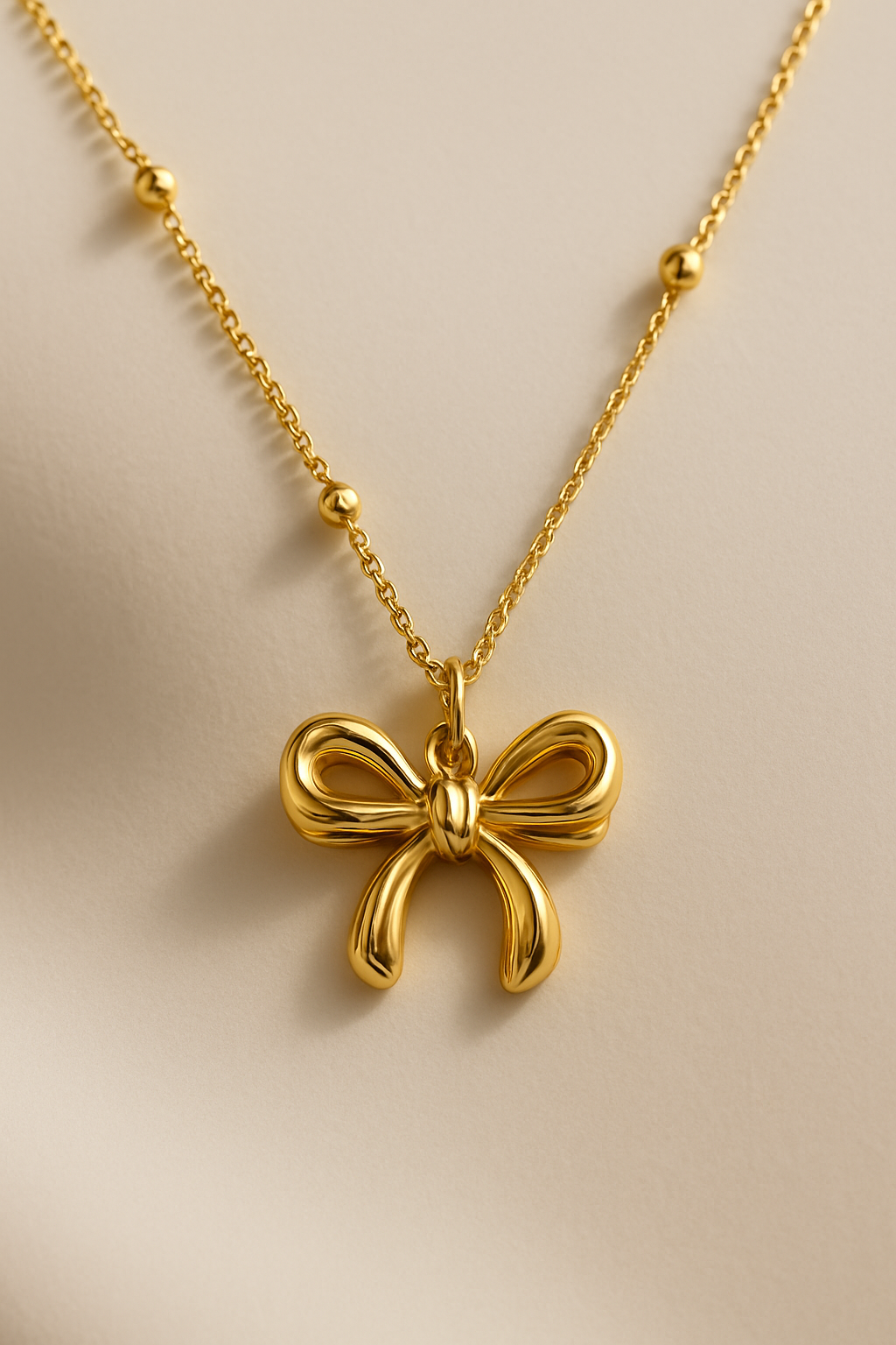 Gold Bow Pendant Necklace