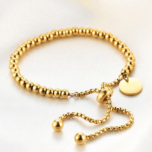 Adjustable Gold Beaded Bracelet with Charm Disc